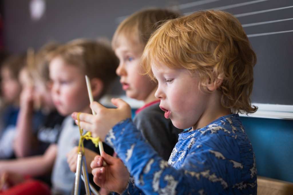 Children in music playschool