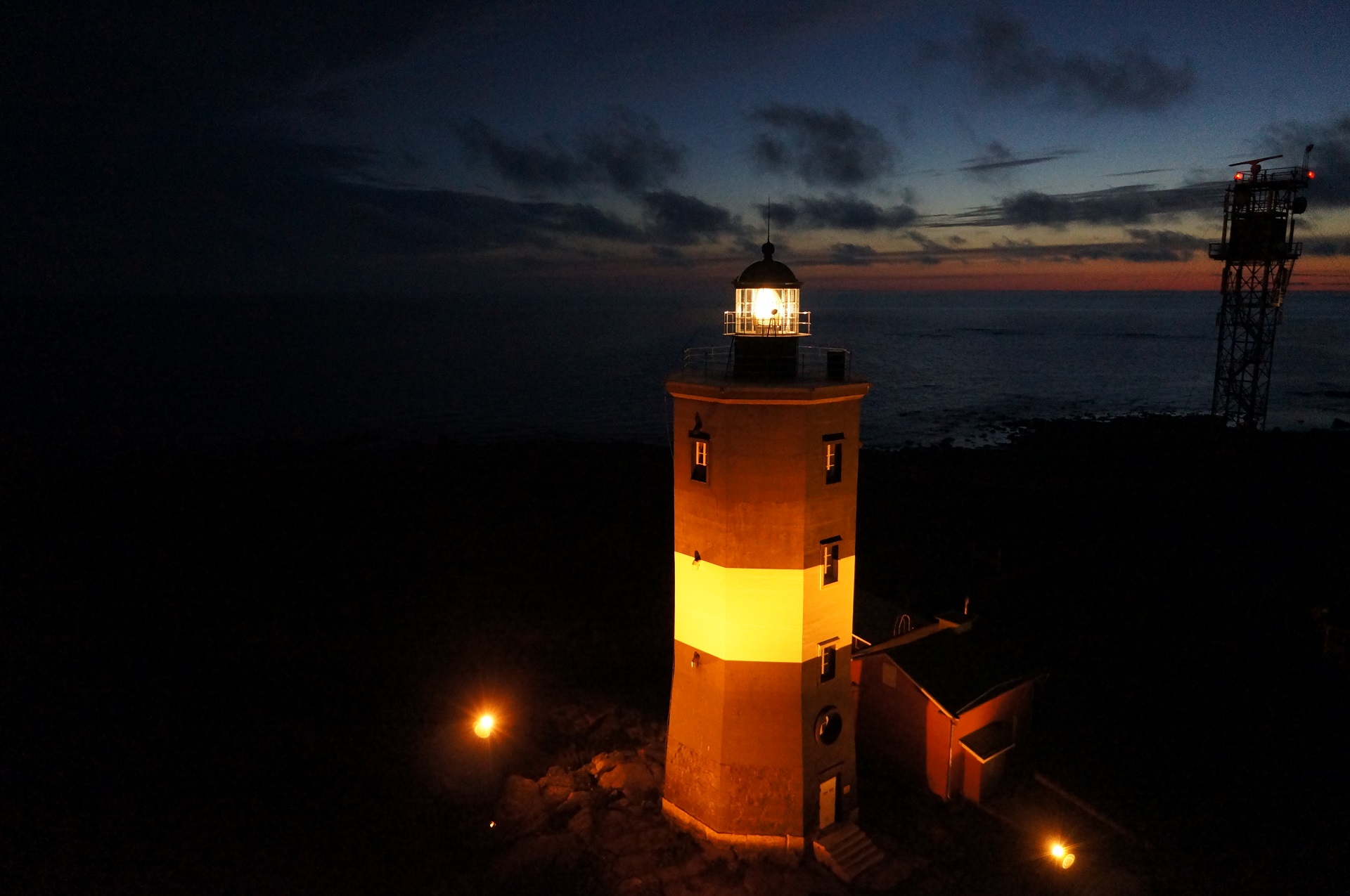 Norrskär island has black and white light house.