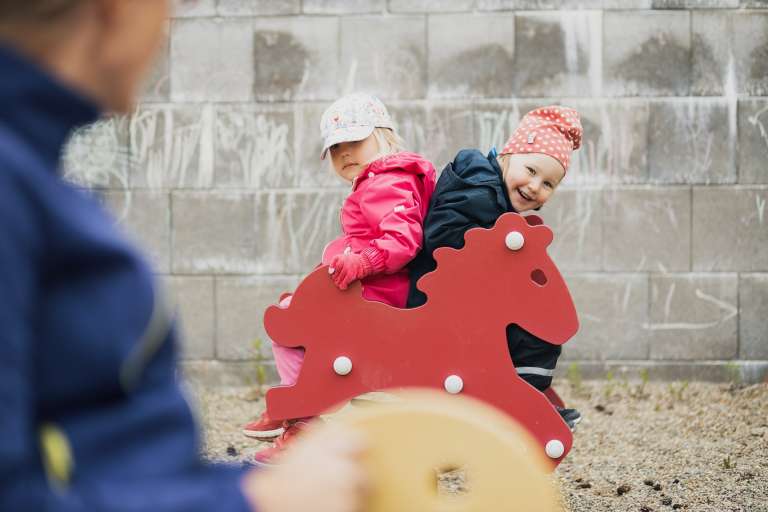 Children playing outside daycare