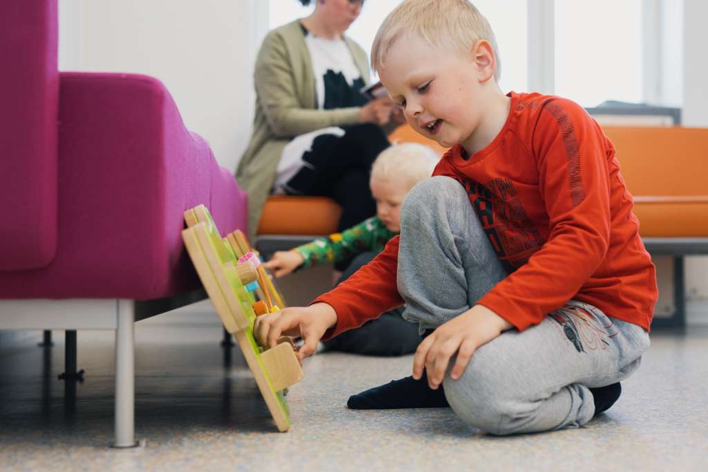 Children playing in child health centre