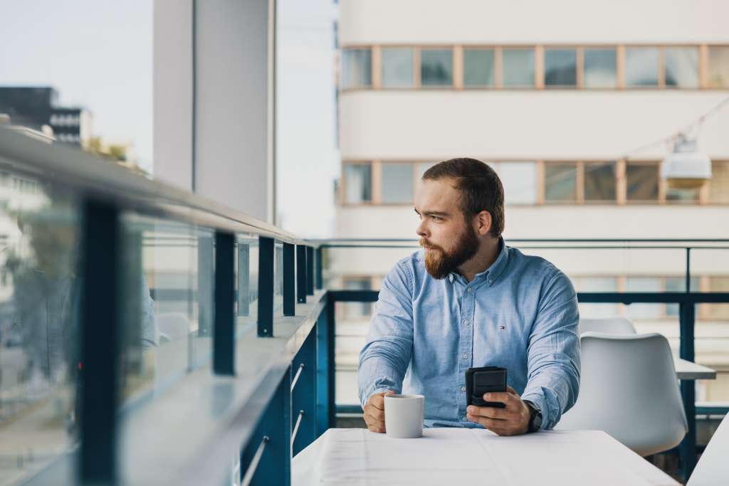 Man drinks coffee