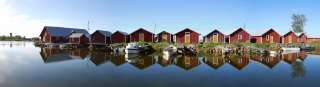 Båthus vid strand